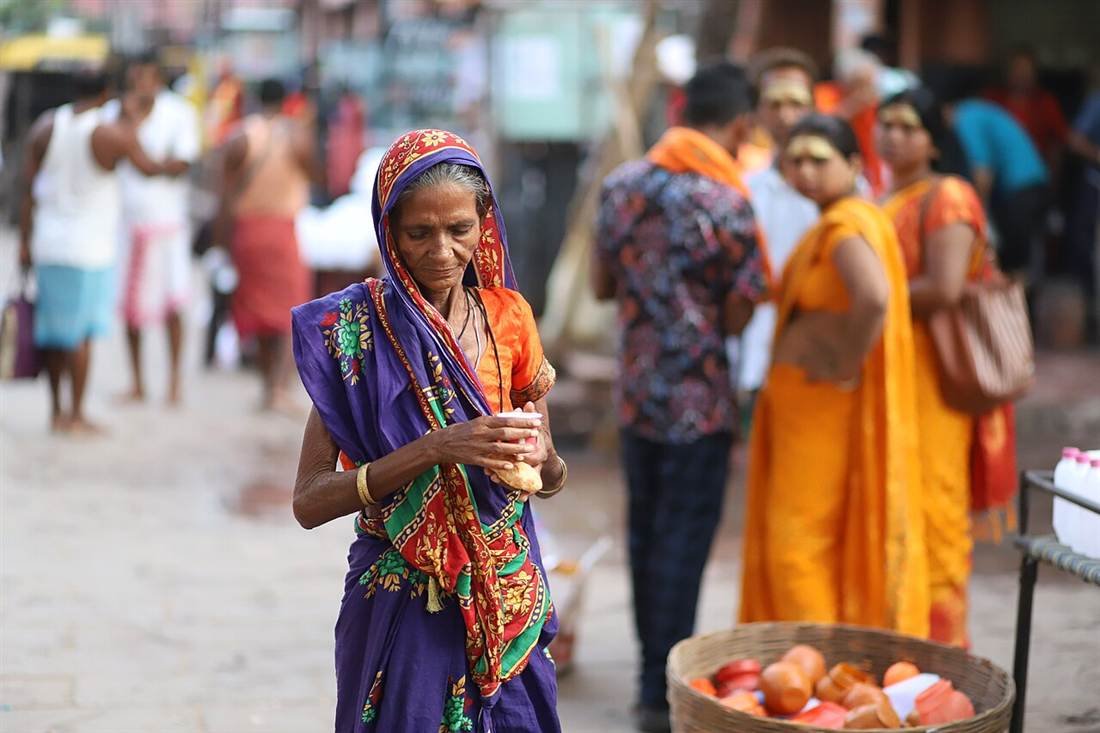 An elderly Hindu woman in a traditional sari in Varanasi, India
